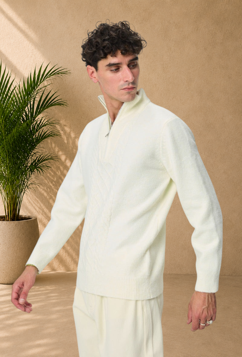Stayin white cable knit sweater with a zip-up mock neck worn by a male model against a plain background
