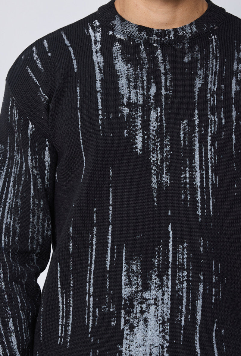 Pull noir motif gris