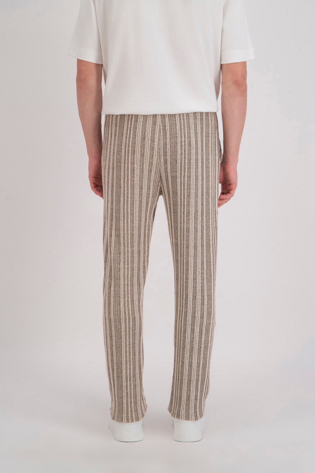 Pantalon beige motif marron