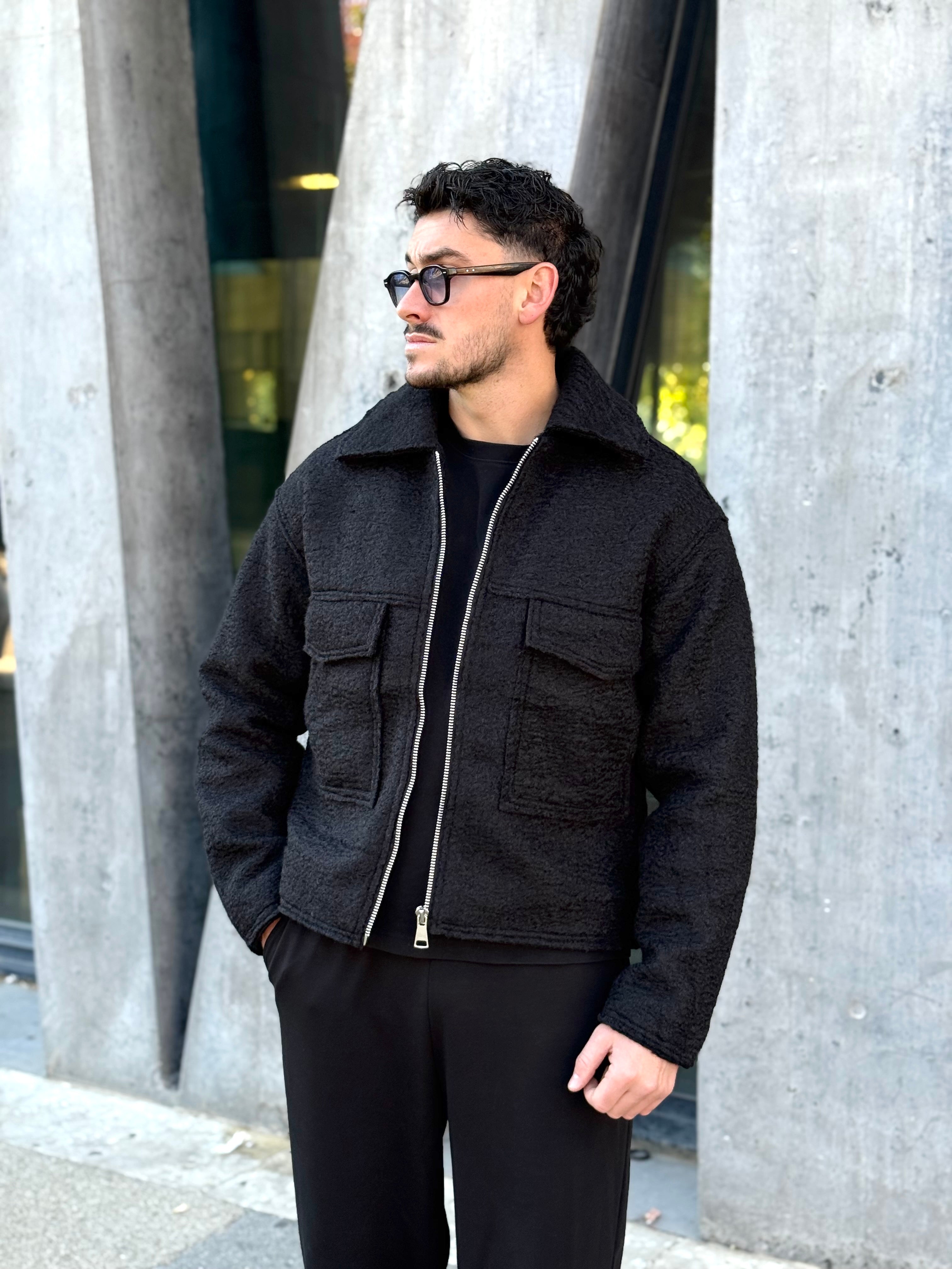 Veste noir en laine bouclée