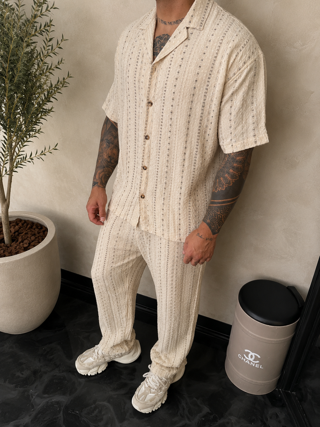 Chemise beige motif noir