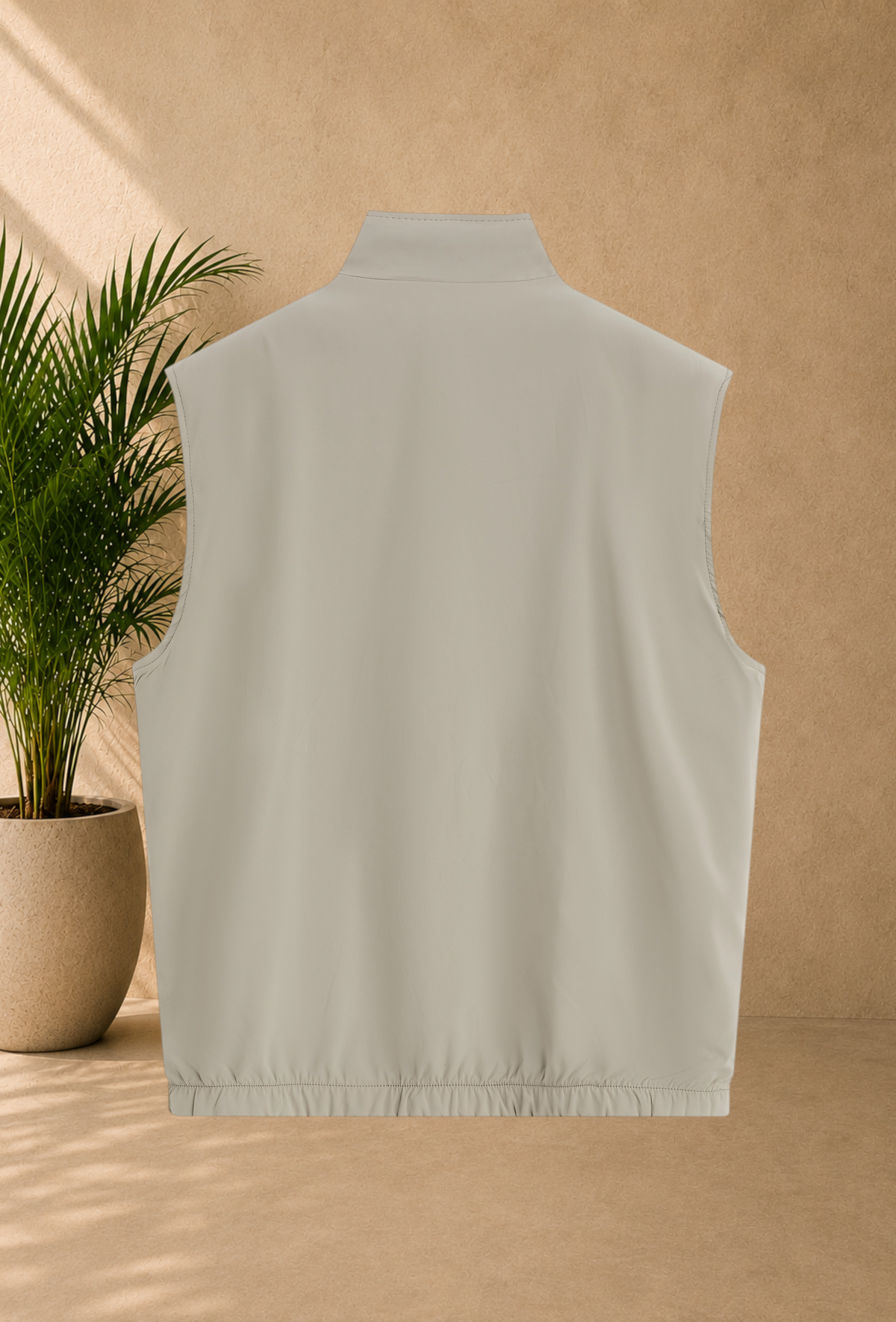 Stayin reversible sleeveless beige vest with a zip closure and a modern straight cut for a casual winter look
