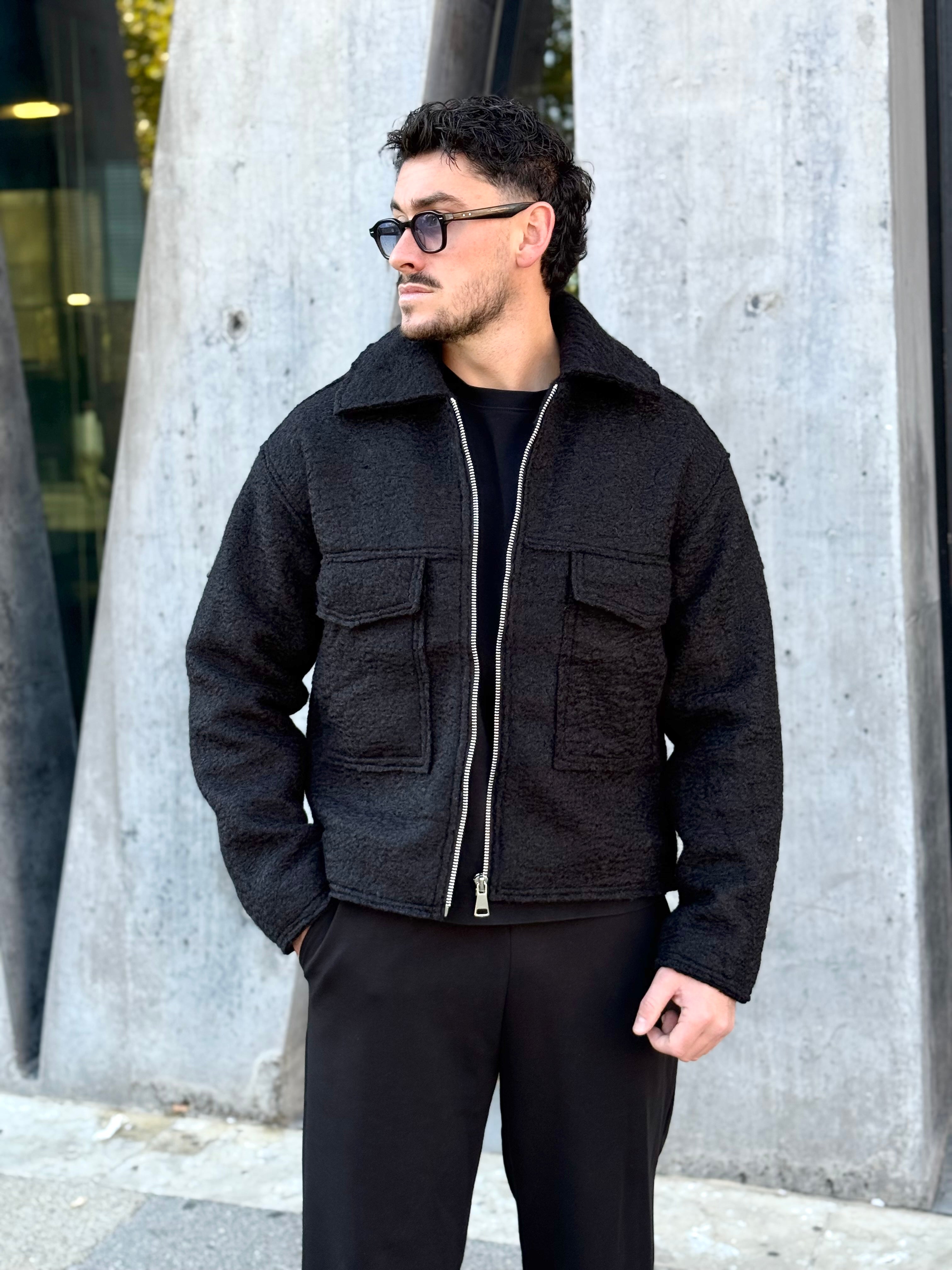 Veste noir en laine bouclée