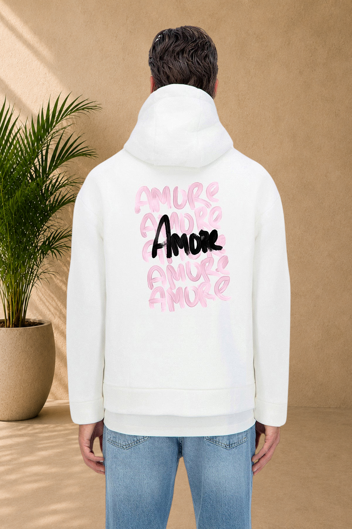 Stayin white quilted hoodie with Amore graphic print on the back worn by a model