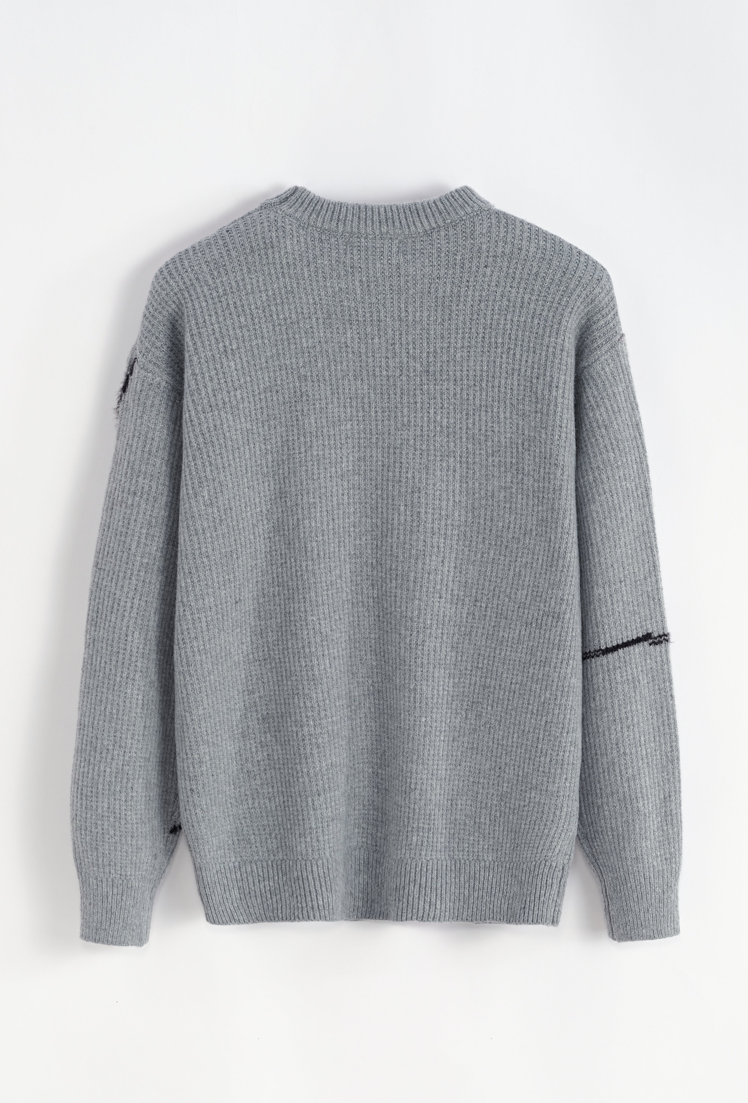 Pull maille gris motif noir