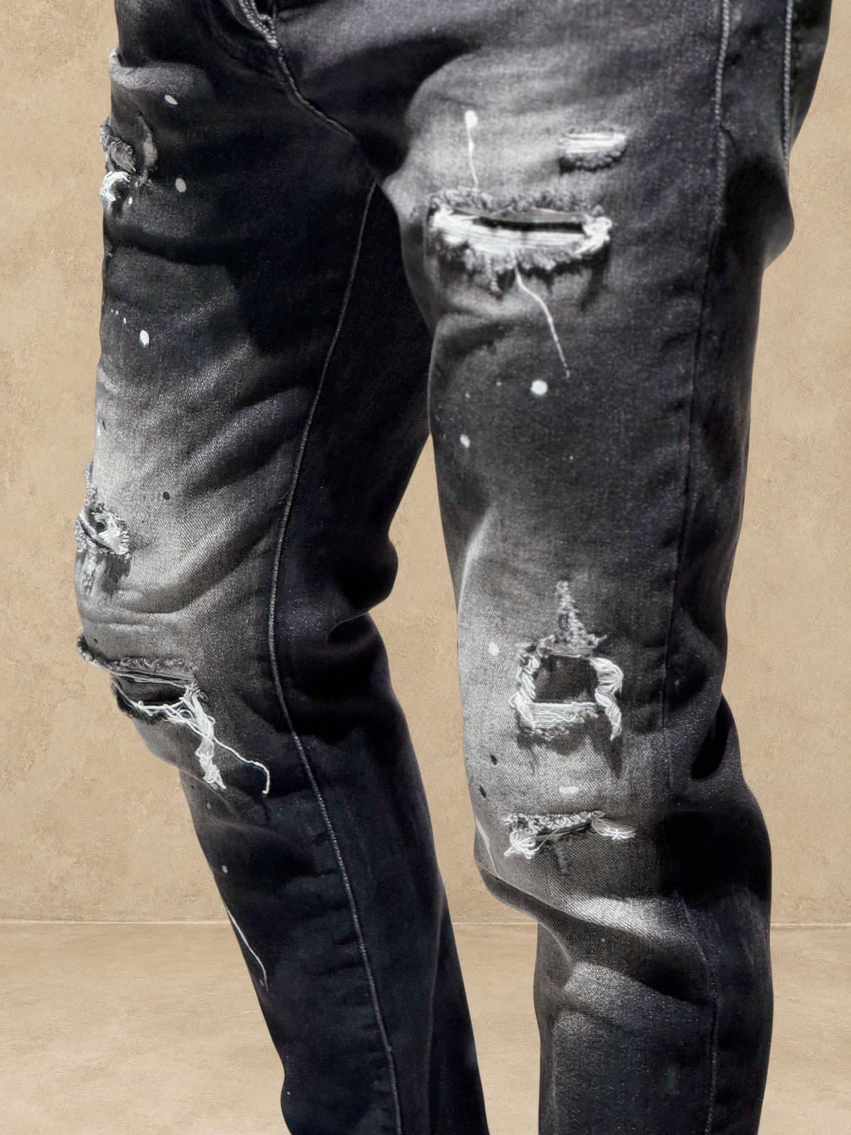 Jean slim Stayin gris et noir avec effets délavés et détails déchirés aux genoux pour un look urbain