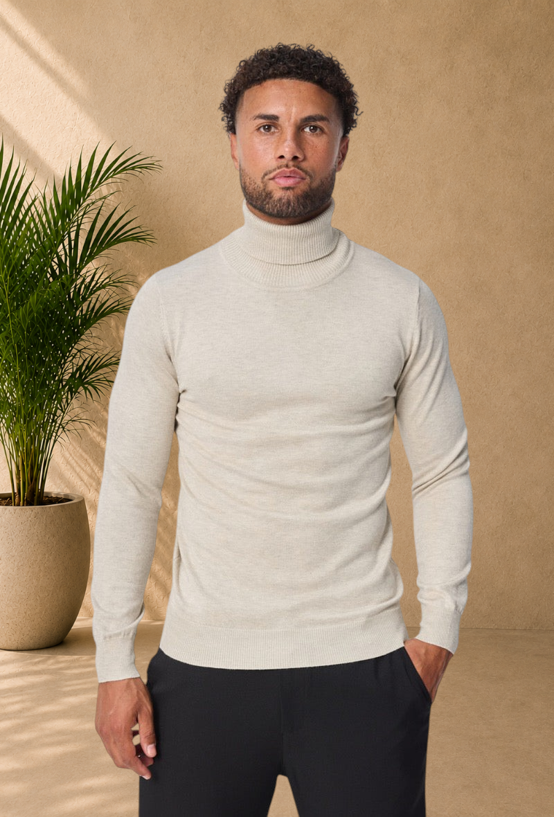 Stayin beige slim-fit turtleneck sweater worn by a male model against a plain white background