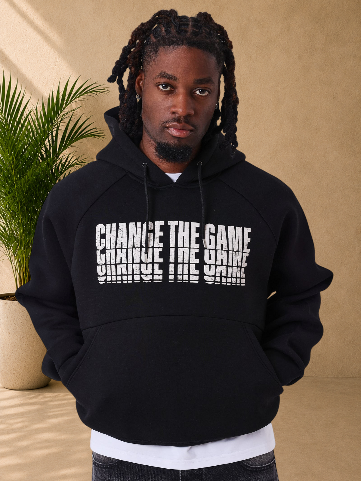 Stayin black regular fit hoodie with Change The Game distorted text print on chest and kangaroo pocket