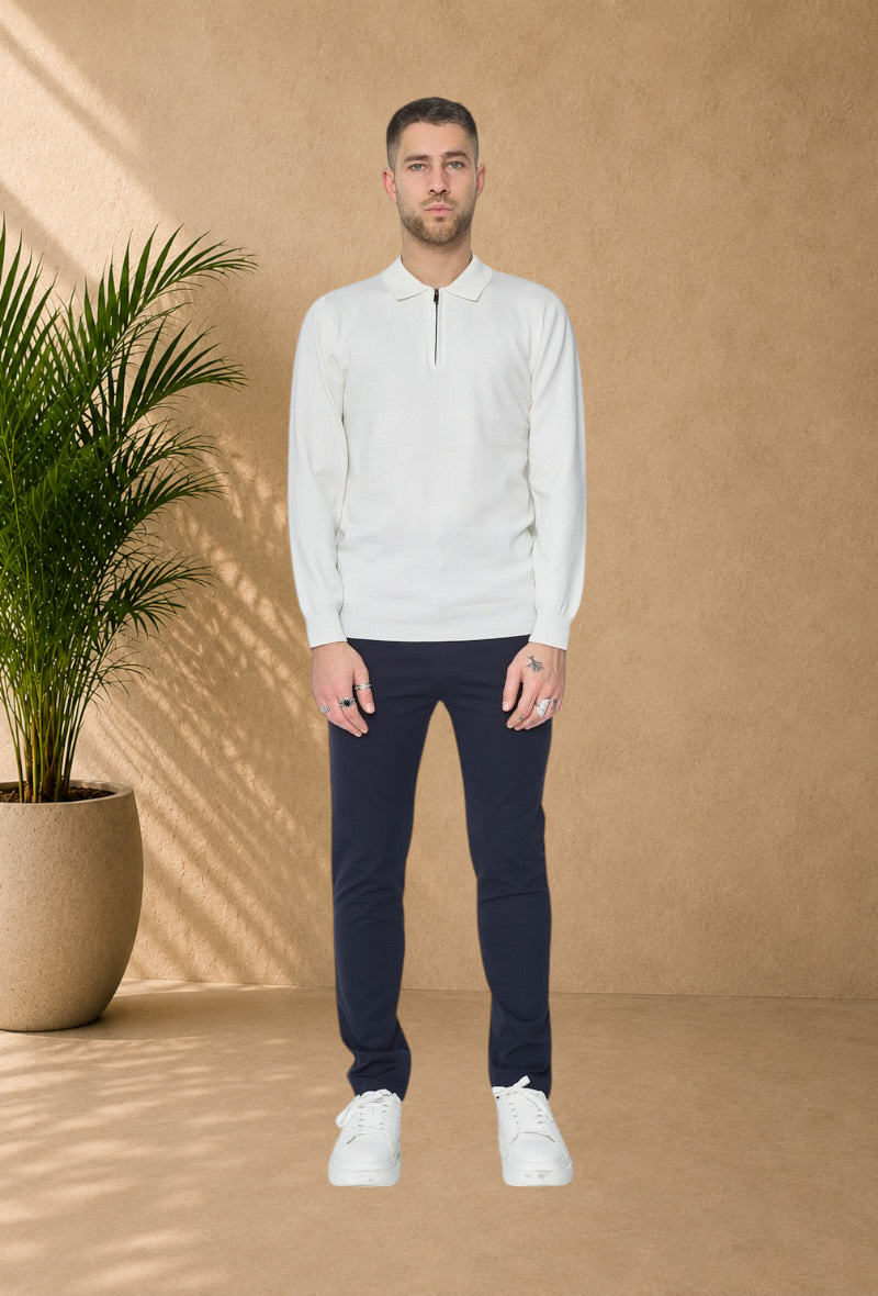 Stayin white long sleeve polo sweater with a zip collar worn by a model on a plain background