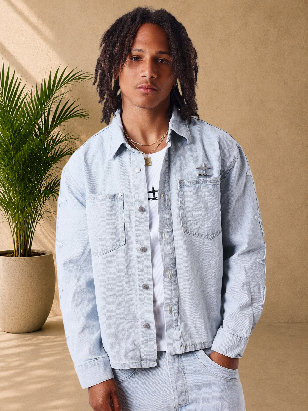 Stayin PXP light blue loose-fit denim shirt jacket with Polaris sleeve patches and metallic chest logo