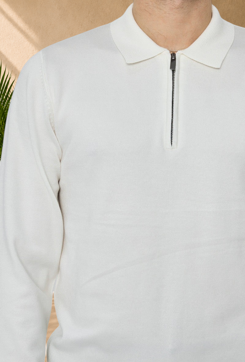 Stayin white long sleeve polo sweater with a quarter zip collar in fine knit fabric worn by a model