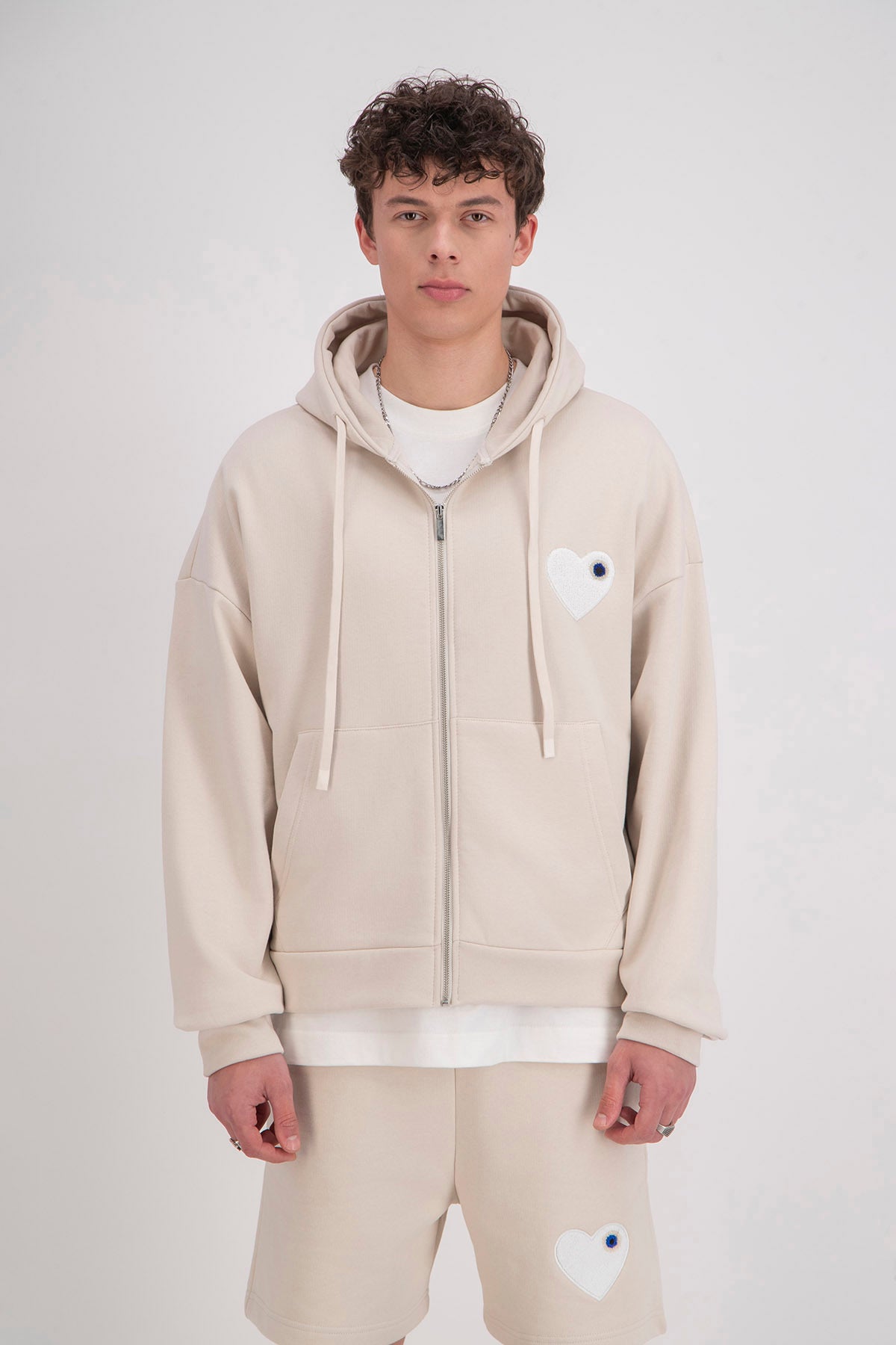 Veste / Sweat zip capuche beige Cœur blanc