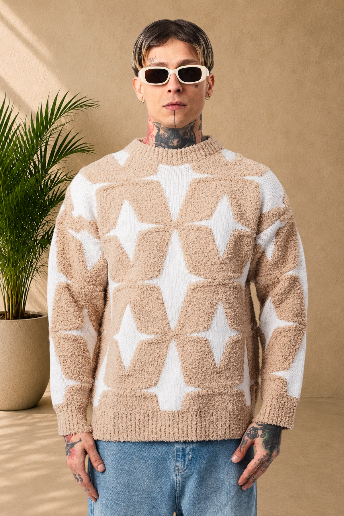 Stayin fluffy beige and white sweater with star pattern, crew neck, and textured knit worn by a male model.