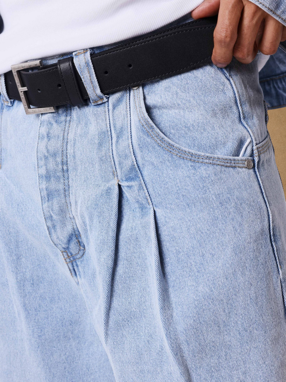 Stayin PXP light blue loose-fit jeans with front pleats, belt loops, and side pockets in cotton blend fabric