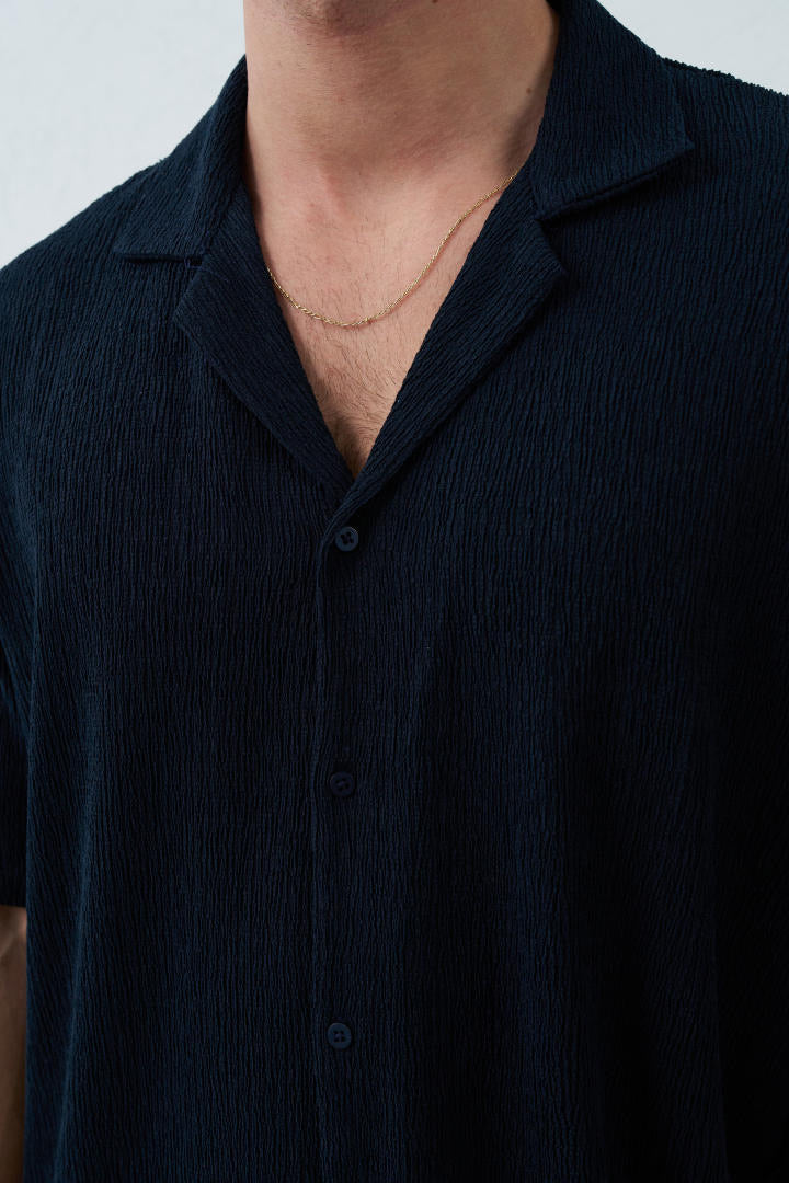 Chemise manches courtes texturée bleu marine