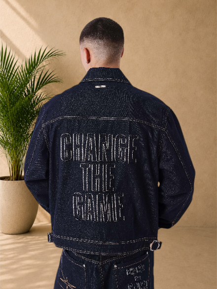 Stayin PXP dark blue denim jacket with oversized fit, contrast stitching, and Change The Game back embroidery