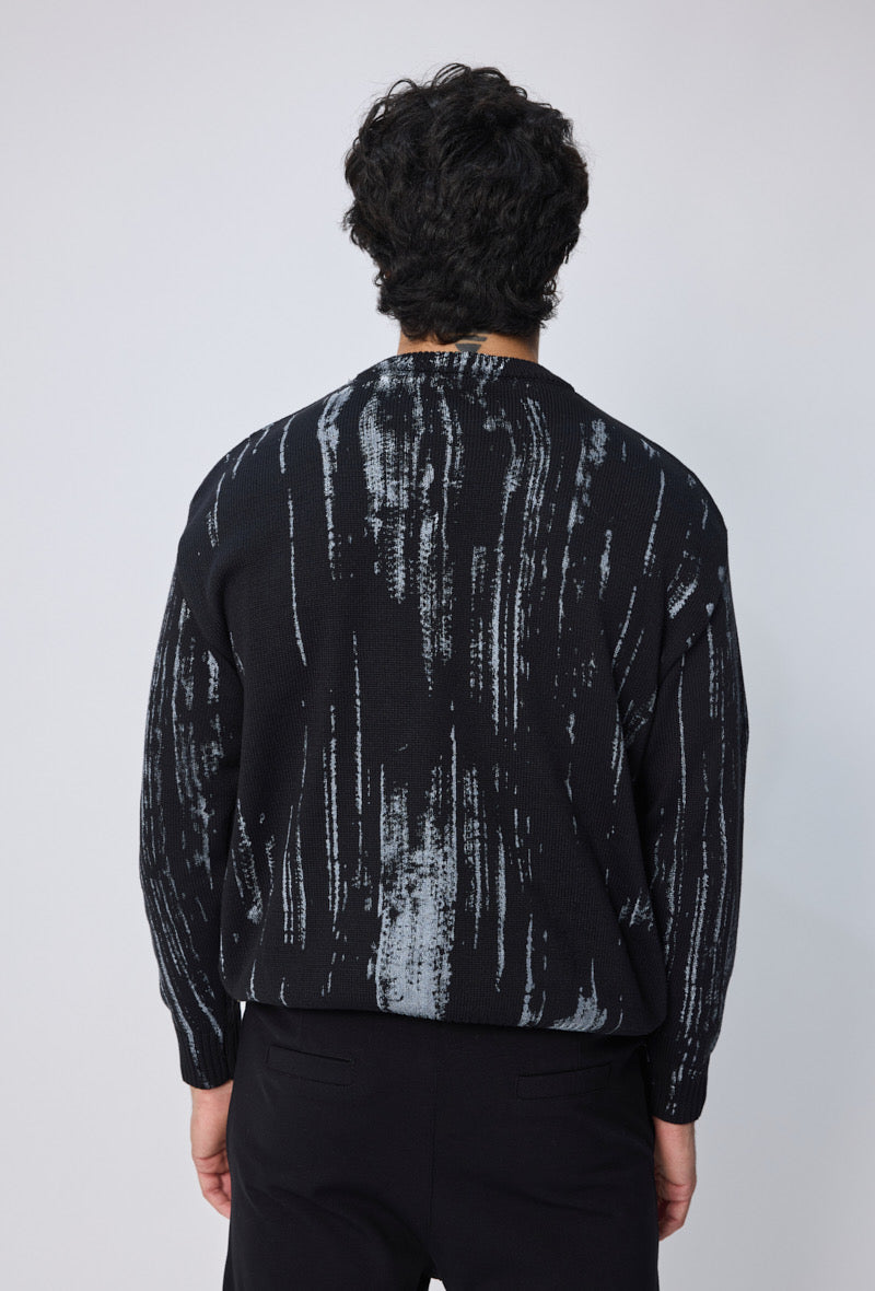 Pull noir motif gris