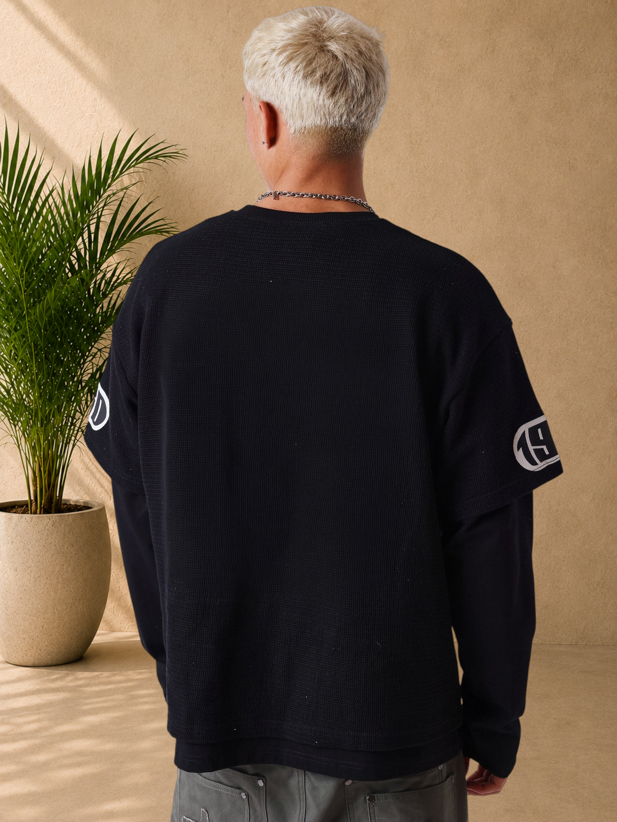 Stayin PXP black long sleeve layered t-shirt with ribbed crew neck and graphic prints on sleeves, back view