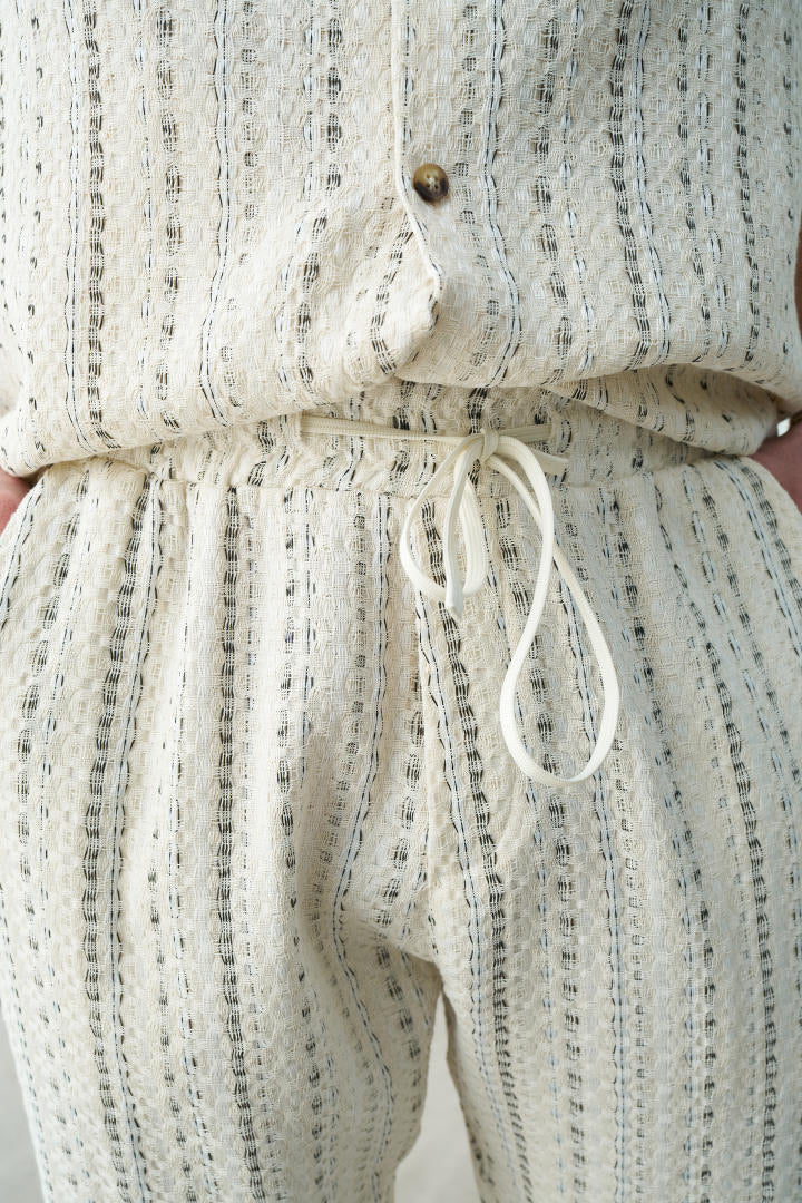Pantalon beige motif
