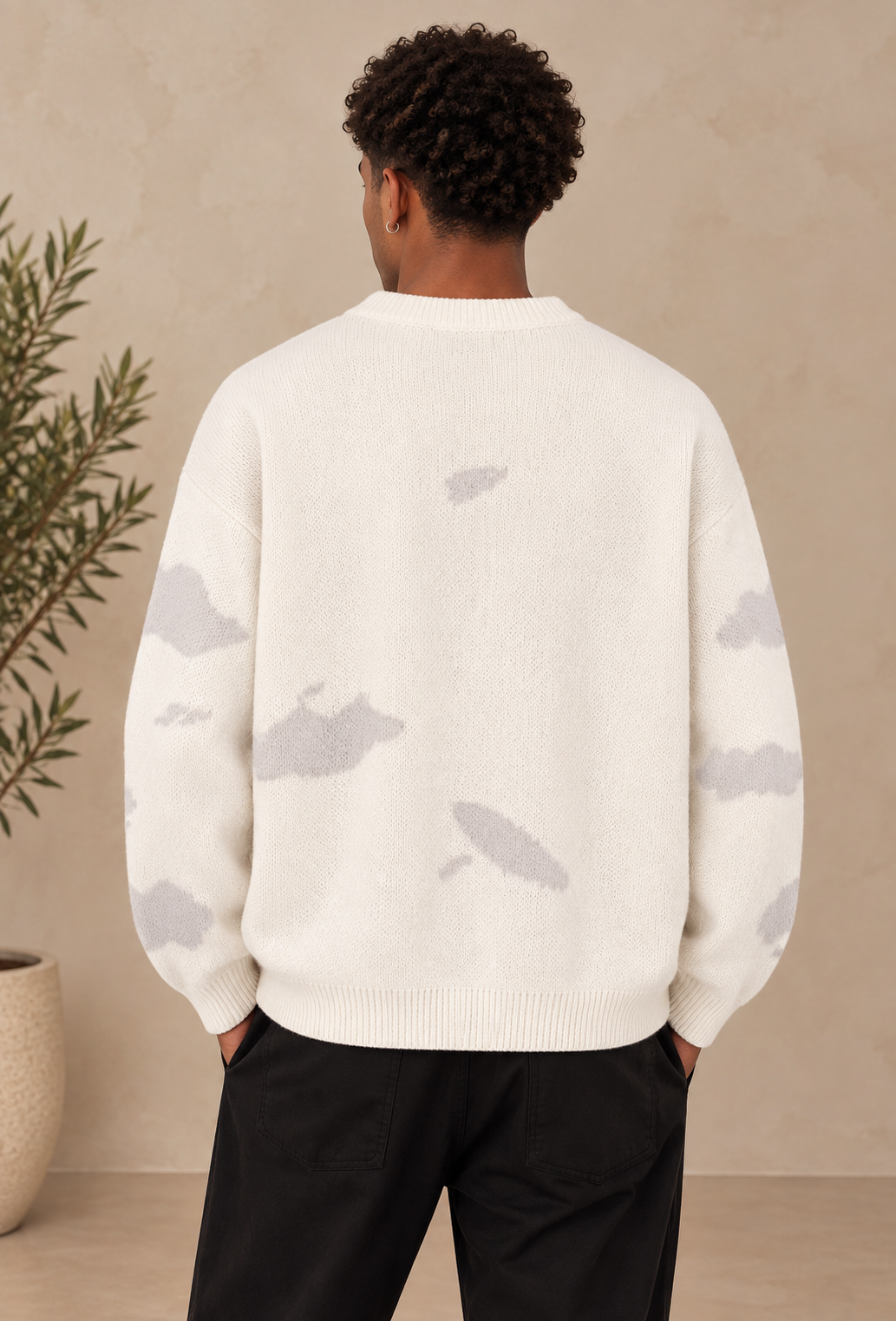 Pull beige motif nuage