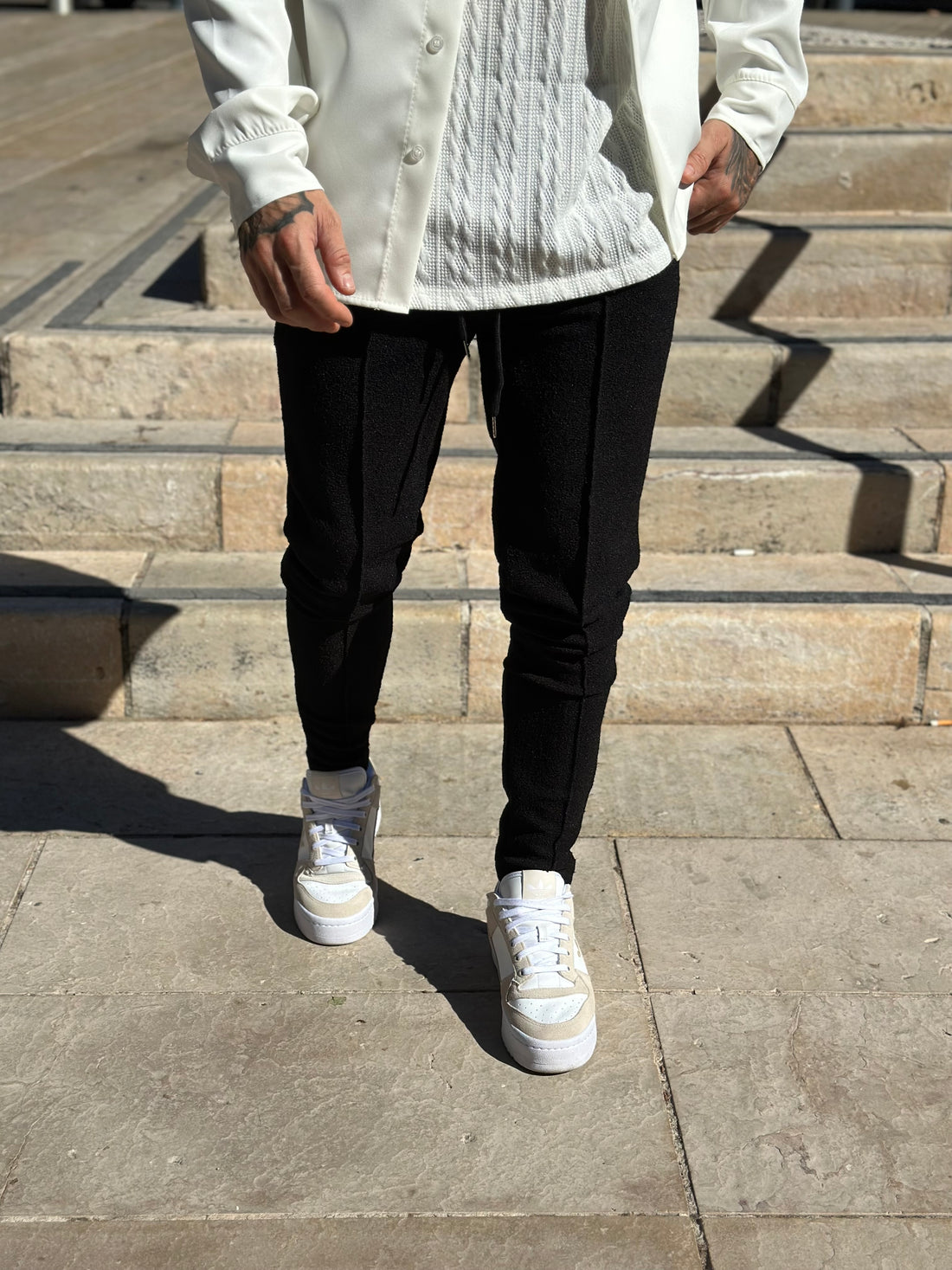 Black embossed pants