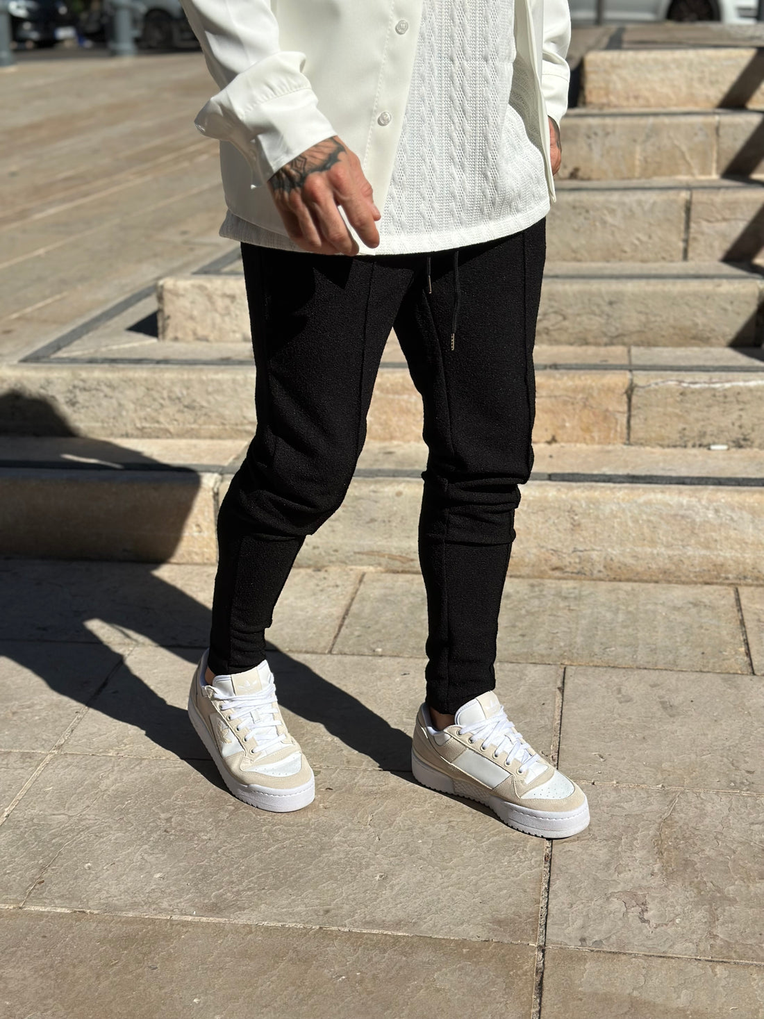 Black embossed pants