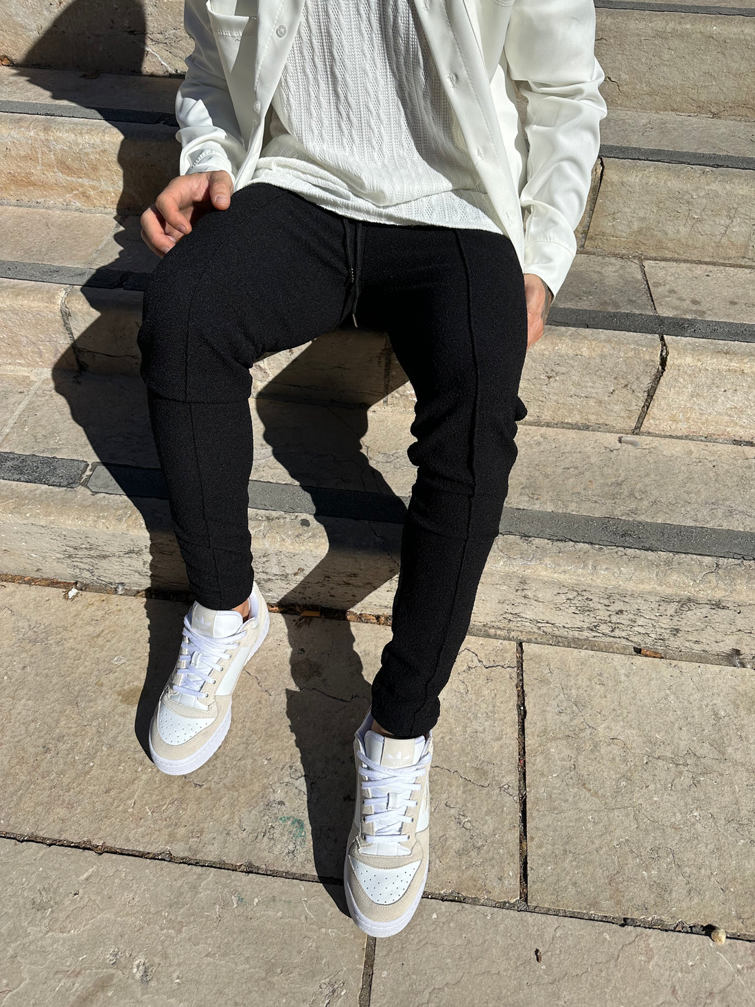 Black embossed pants