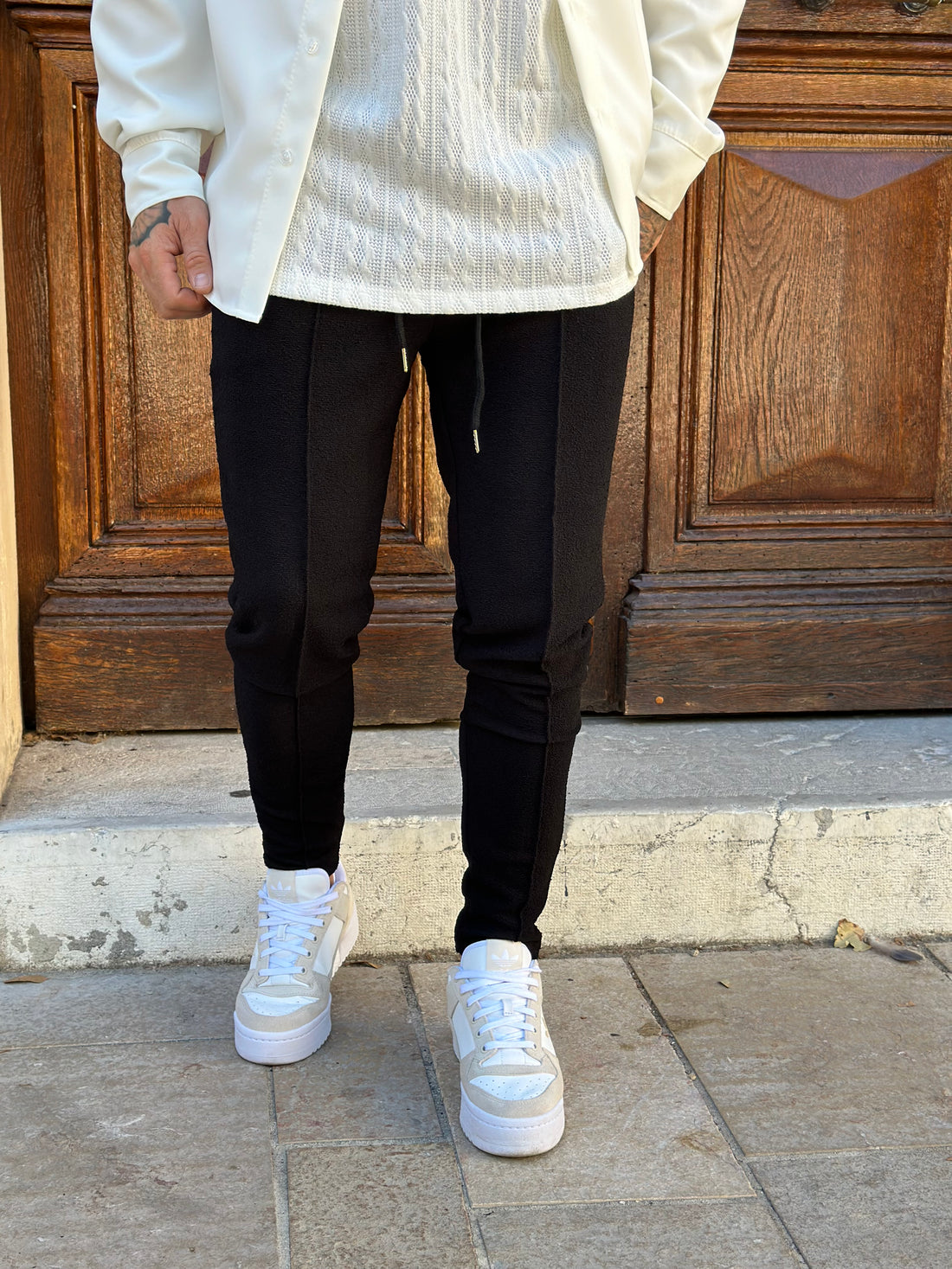 Black embossed pants