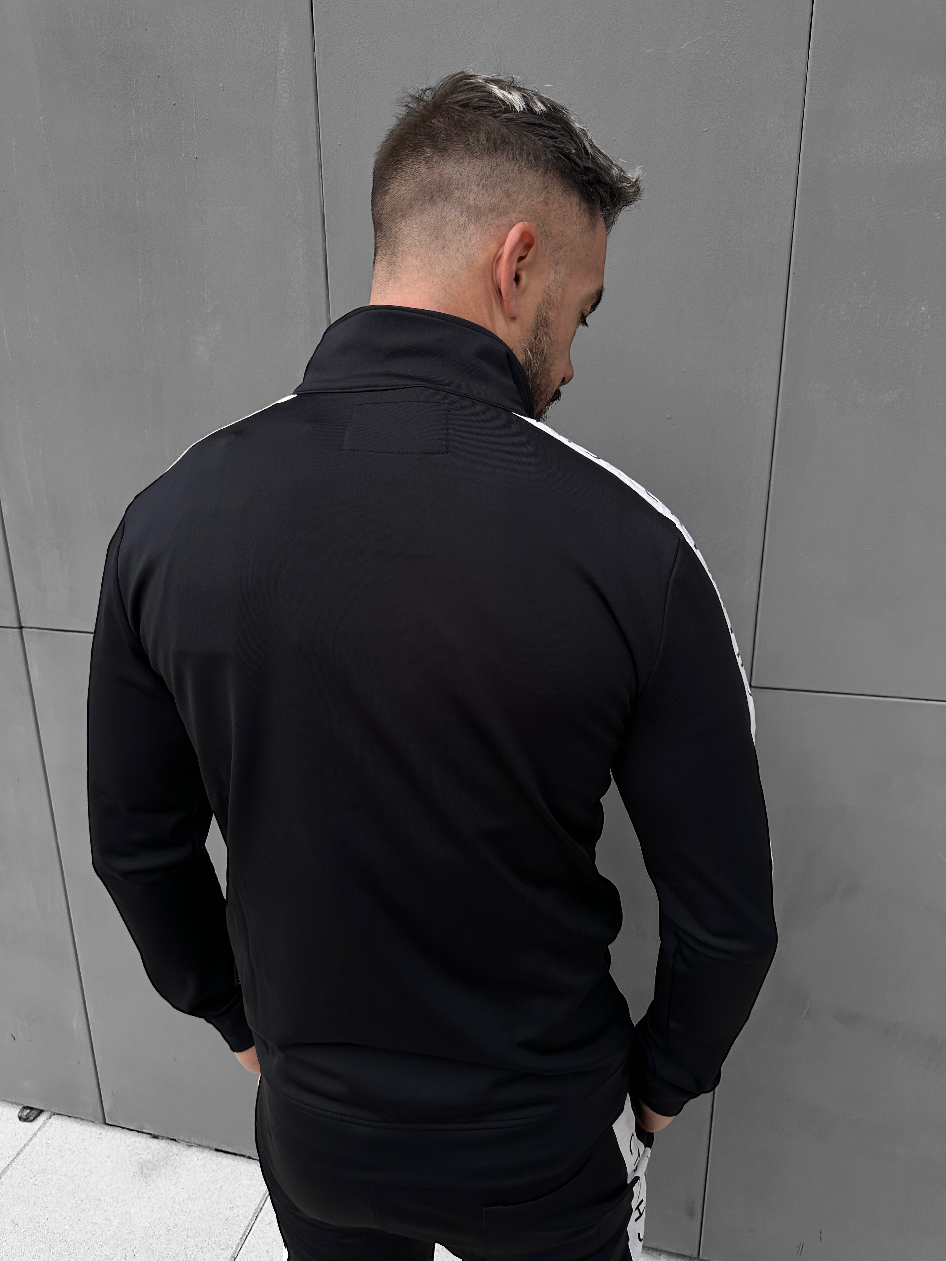 CHABRAND - Black jogging jacket with white stripe