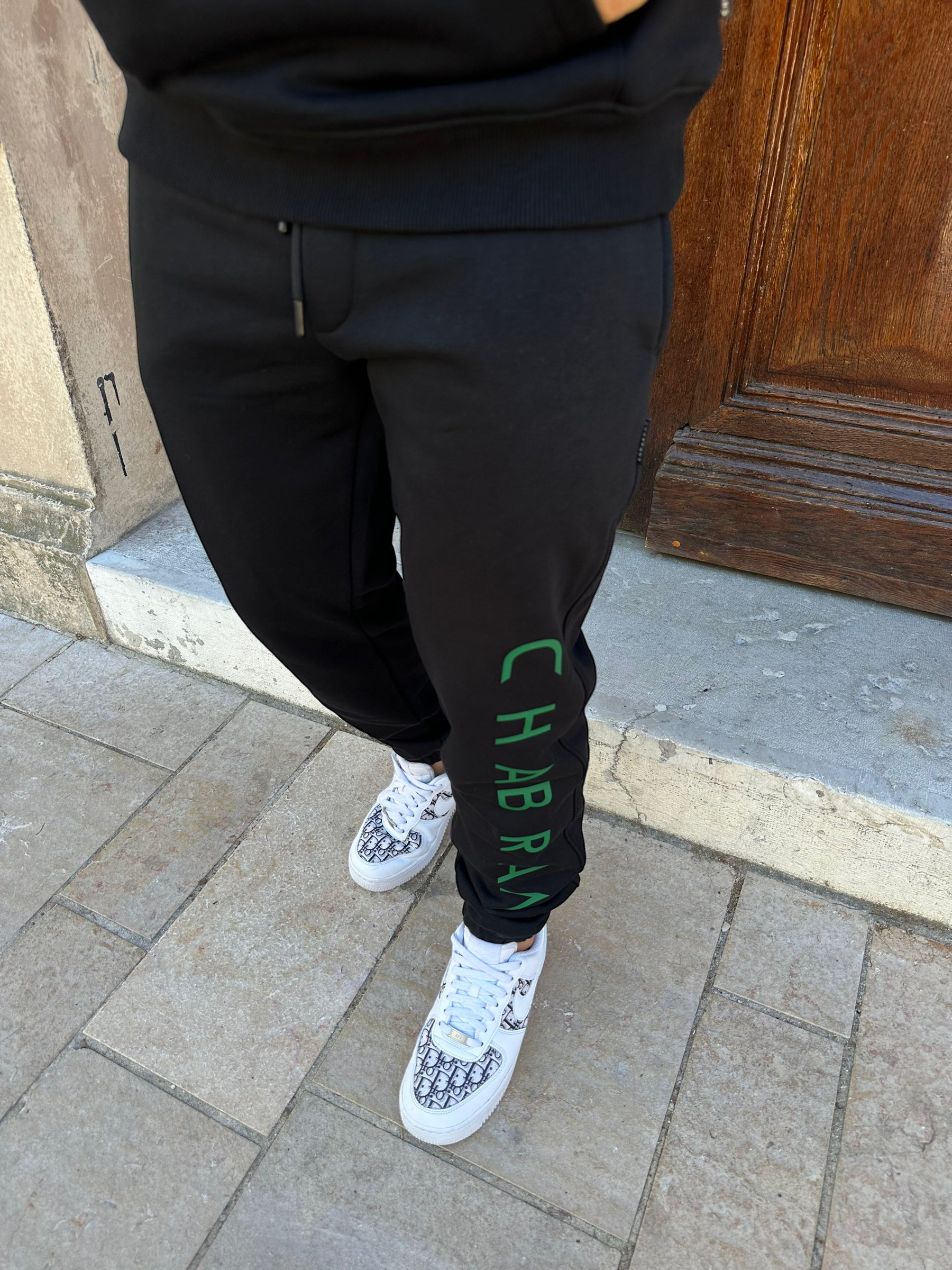 CHABRAND - Black jogging pants with green sign