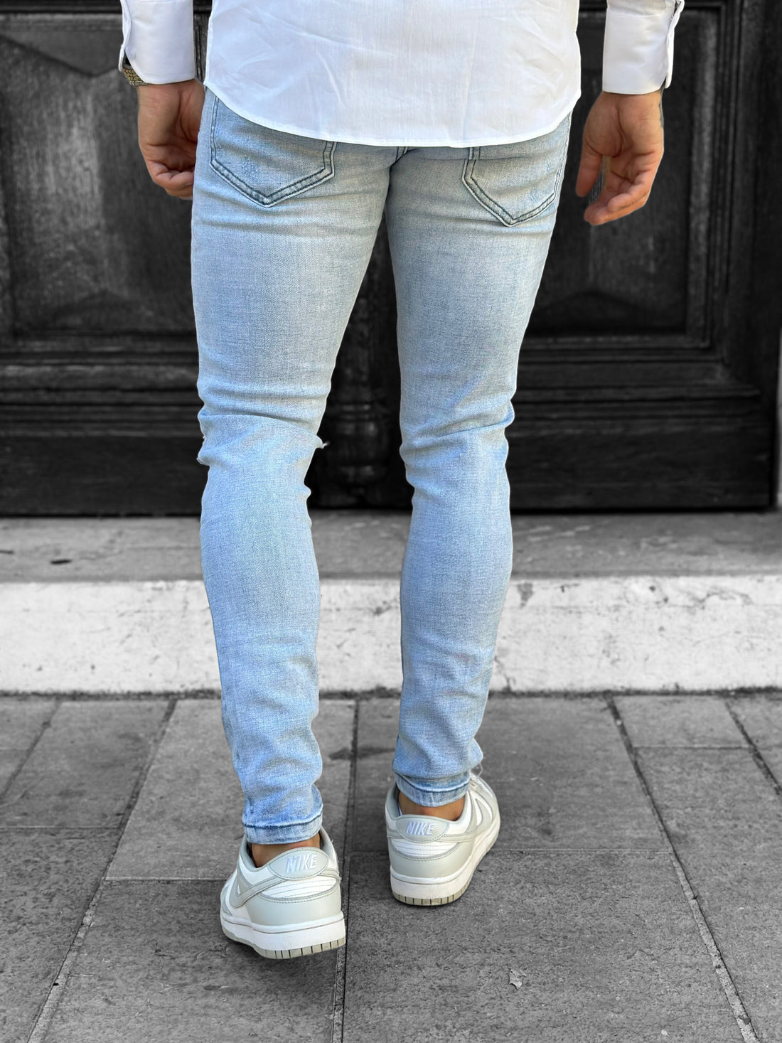 Light blue destroyed slim jeans