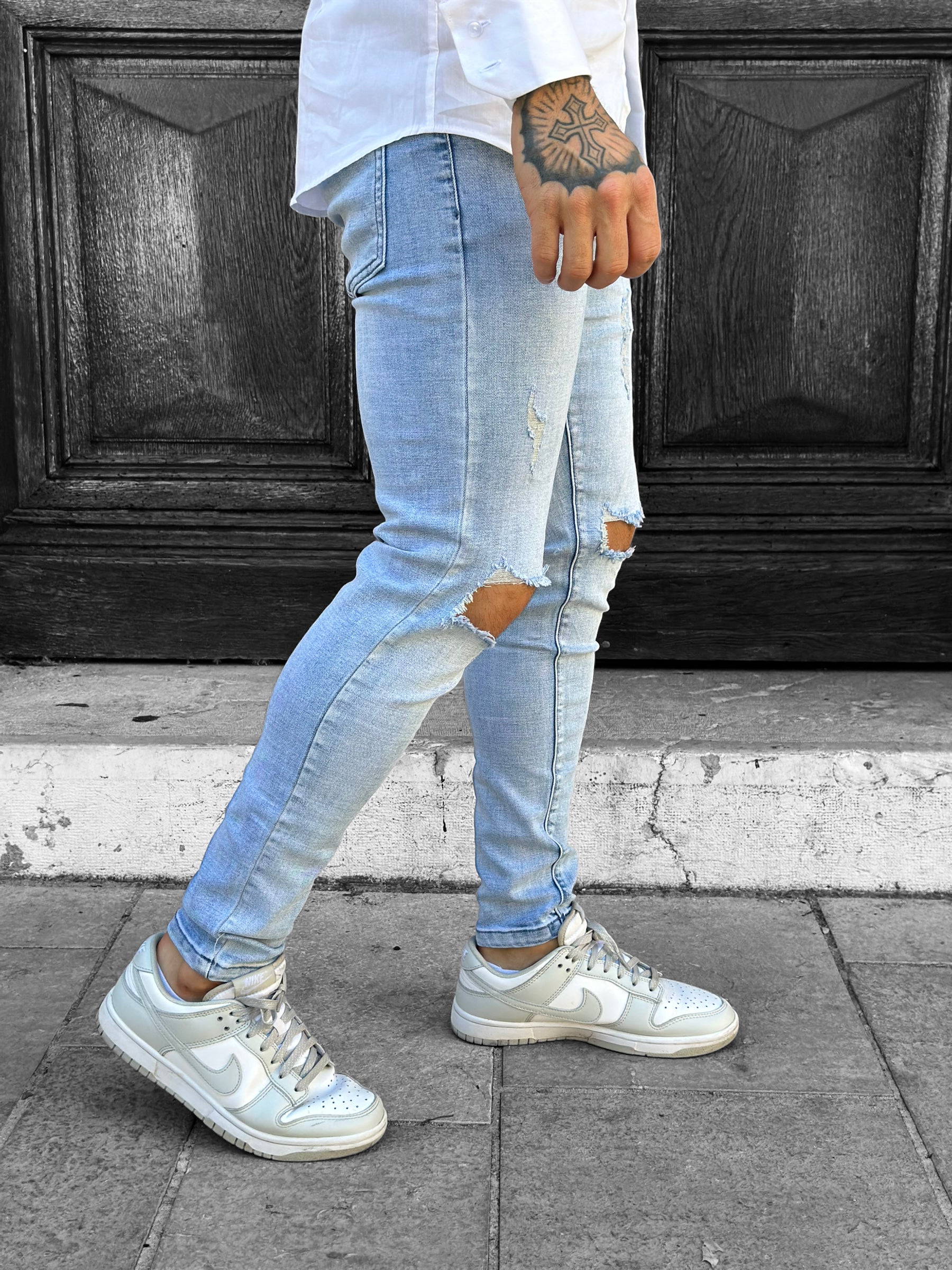 Light blue destroyed slim jeans