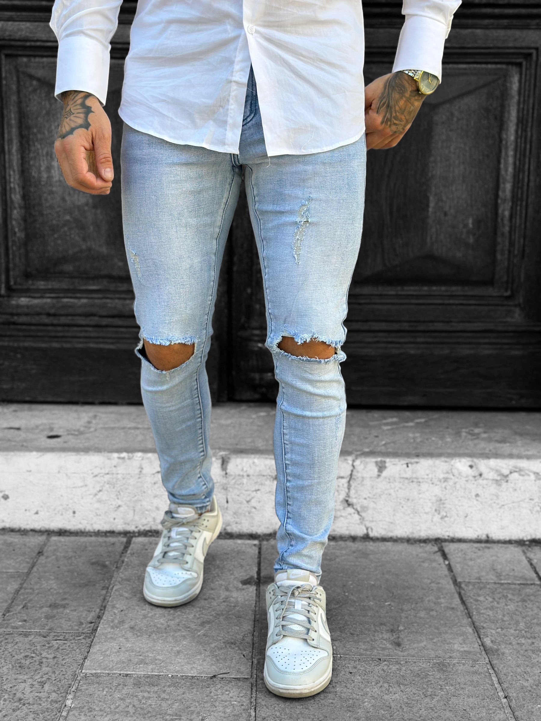 Light blue destroyed slim jeans